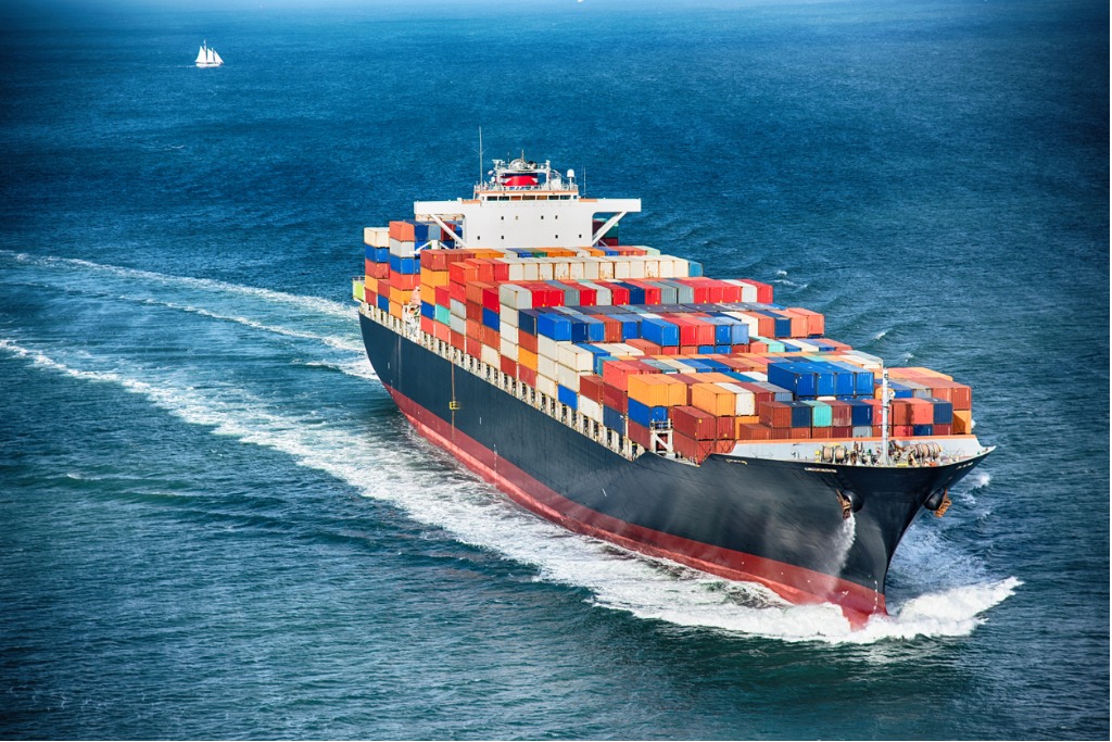 This image has an empty alt attribute; its file name is generic-cargo-container-ship-at-sea-picture-id591986620-1-1.jpg